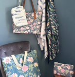 Carry-All tote in Airy Cosmos worn with jeans and a black shirt, it adds style and sophistication. 