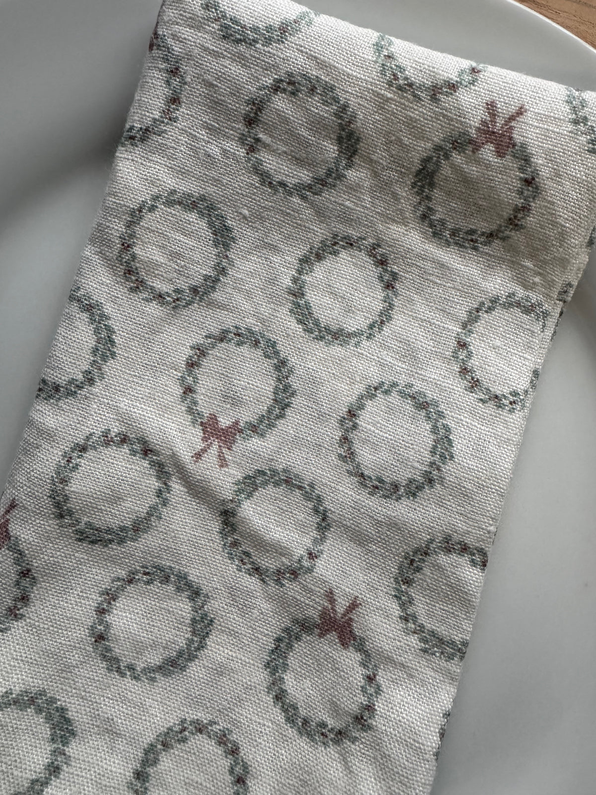 European Linen Napkin with holiday or Christmas Wreaths 