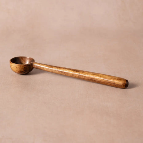 hand-carved wooden coffee scoop