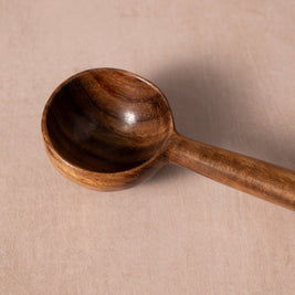 hand-carved wooden coffee scoop