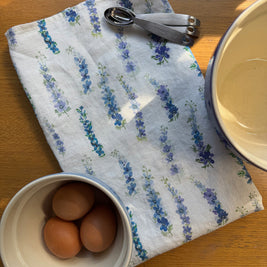 dancing delphinium linen tea towel